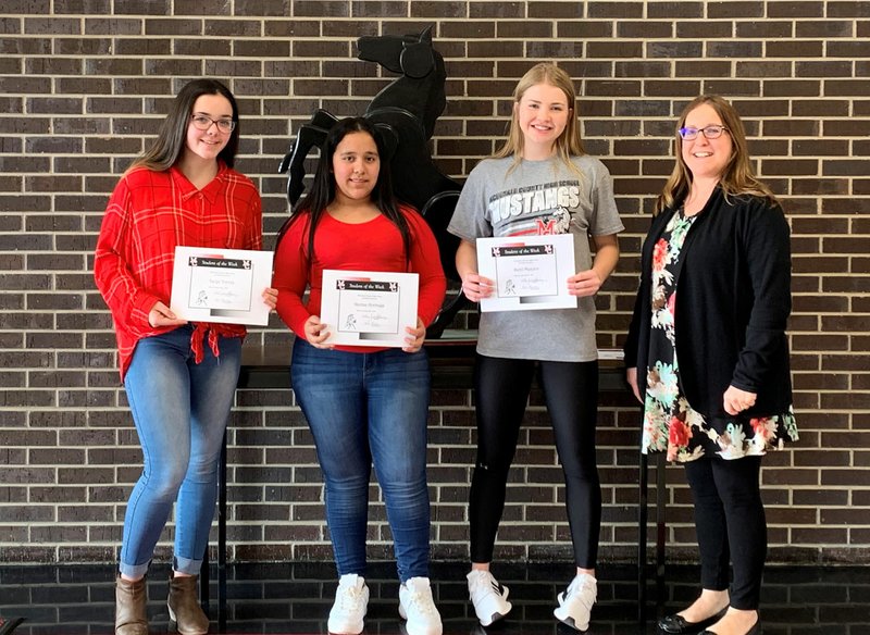 Photo Submitted McDonald County High School students chosen for the week of Jan. 6 through 10 are Teryn Torrez (left), freshman; Karina Archaga, sophomore; Demi Meador, senior; with Mrs. Holloway. Not shown is Caitlyn Barton, junior.