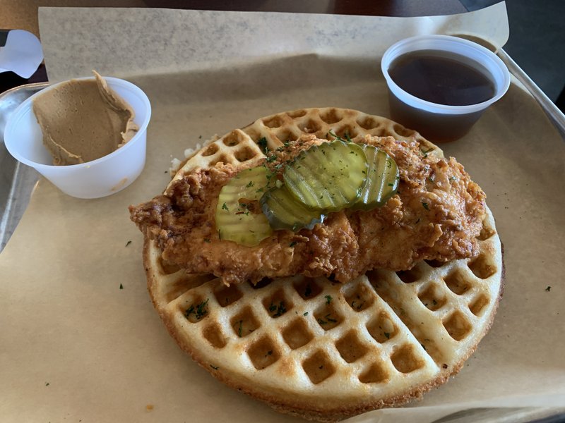 Chicken & Waffles come with peanut butter (or butter) and maple syrup at Newfangled Love Kitchen.
(Arkansas Democrat-Gazette/Eric E. Harrison)