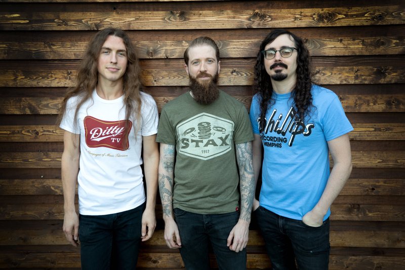 Andrew Denham (left, drums), Justin Toland (guitar, vocals) and Thomas Storz (bass) are the members of Dirty Streets, a Memphis band playing White Water Tavern at 8:30 p.m. today. The band plays Maxine's in Hot Springs at 9 p.m. Saturday.
(Special to the Democrat-Gazette/Bob Bayne)

