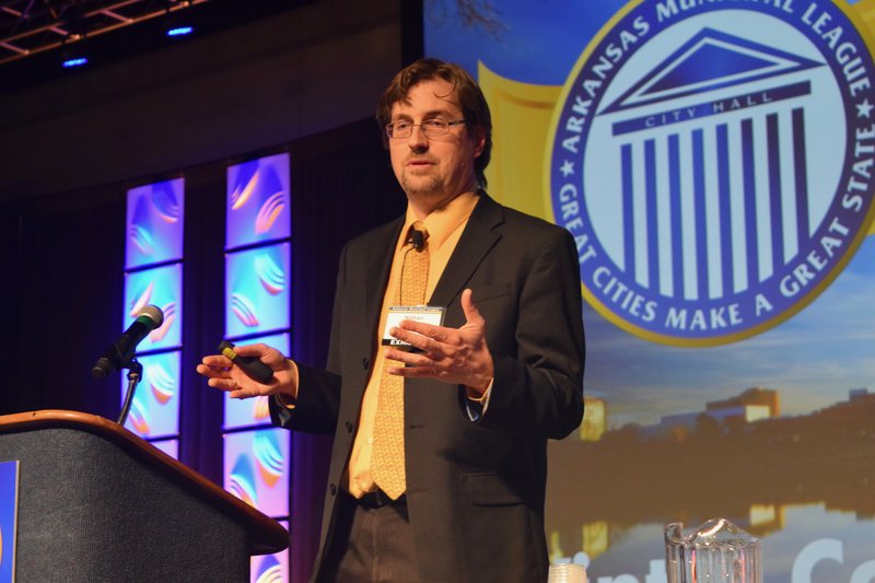 Arkansas Broadband Manager Nathan Smith speaks at a panel on the governor's rural broadband initiative in Little Rock on Thursday.