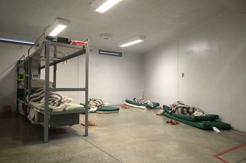 In this Feb. 14, 2014, file photo, inmates rest in their beds at the Washington County Jail in Fayetteville.