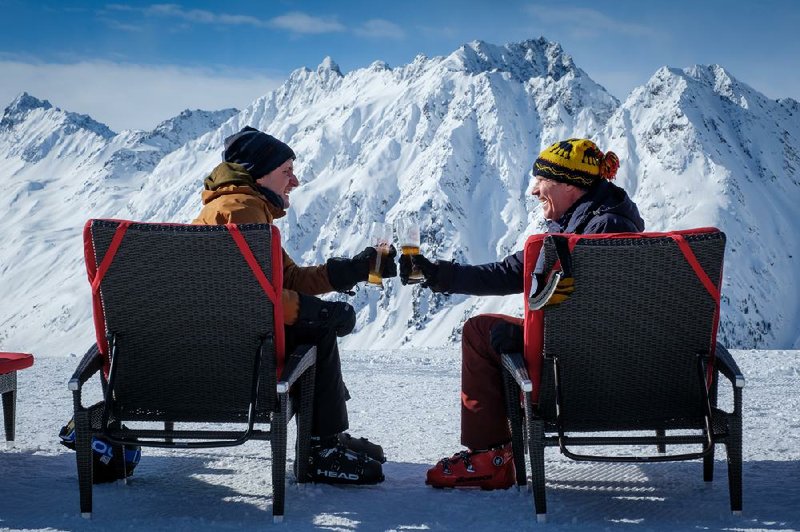 Zach (Zach Woods) and Pete (Will Ferrell) are competitive friends and co-workers in Downhill, a movie about the fragility of the male ego.