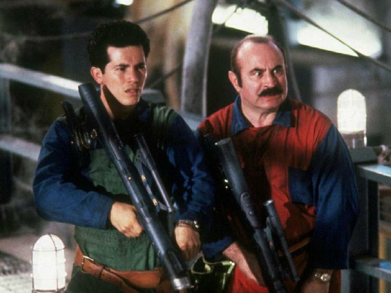 John Leguizamo and Bob Hoskins star in 1993’s Super Mario Bros, the bad video game movie that started it all.