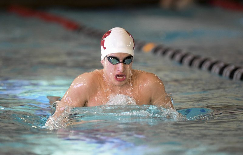 Springdale freshman Kevin Brumfield swims in the boys 200 yard medley relay, Thursday, February 13, 2020 during the 6A-West Conference swim meet at the Jones Center in Springdale. Check out nwaonline.com/200214Daily/ for today's photo gallery. (NWA Democrat-Gazette/Charlie Kaijo)