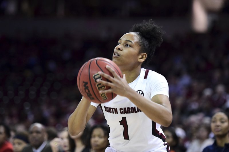 South Carolina guard Zia Cooke (1) attempts to shoot against Auburn during the first half of Thursday's game in Columbia, S.C. - Photo by Sean Rayford of The Associated Press story.lead_photo.caption