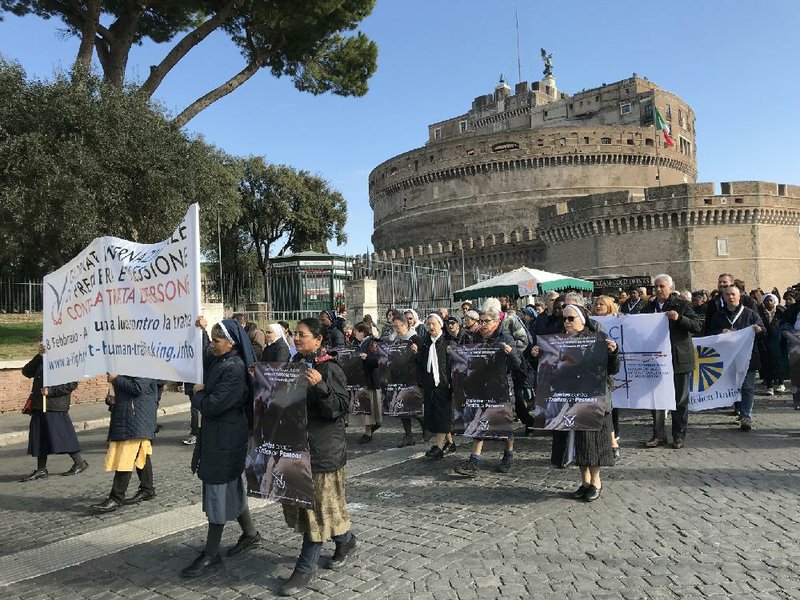 Nuns march through Vatican City to draw attention to the Roman Catholic Church’s efforts to fight human trafficking on Sunday to mark the sixth annual international day of prayer and awareness against human trafficking.
(The New York Times/Elizabetta Povoledo)