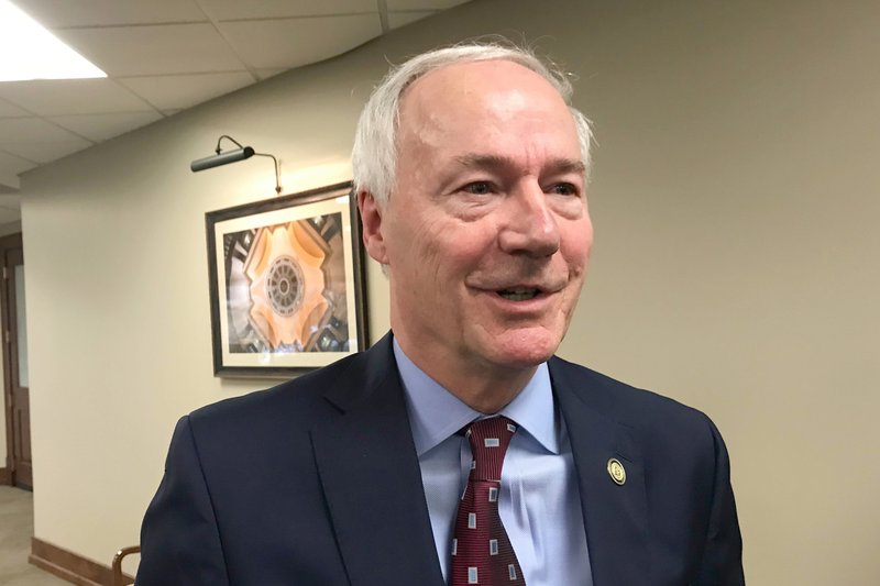 Arkansas Gov. Asa Hutchinson speaks to reporters on Jan. 14 in Little Rock. A federal appeals court panel in Washington has upheld a lower court's decision that blocked the Trump administration's work requirements for Medicaid recipients. The Friday decision from a three-judge panel of the U.S. Court of Appeals in Washington, D.C., found Arkansas' work requirements for Medicaid recipients to be "arbitrary and capricious." Hutchinson said he's hopeful that the U.S. Supreme Court will review the case. - AP Photo/Andrew Demillo