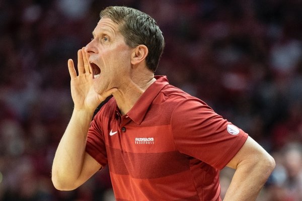 Eric Musselman directs his players in Arkansas' game against Mississippi State at Bud Walton Arena in Fayetteville on February 15, 2020.