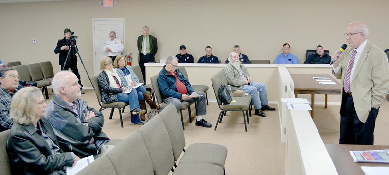 Mayor Peter Christie (right) addresses a crowd gathered at the Bella Vista court facility regarding the bond issue, to be supported by a 1% sales tax on the March 3 primary election ballot. (NWA Democrat-Gazette/Keith Bryant)