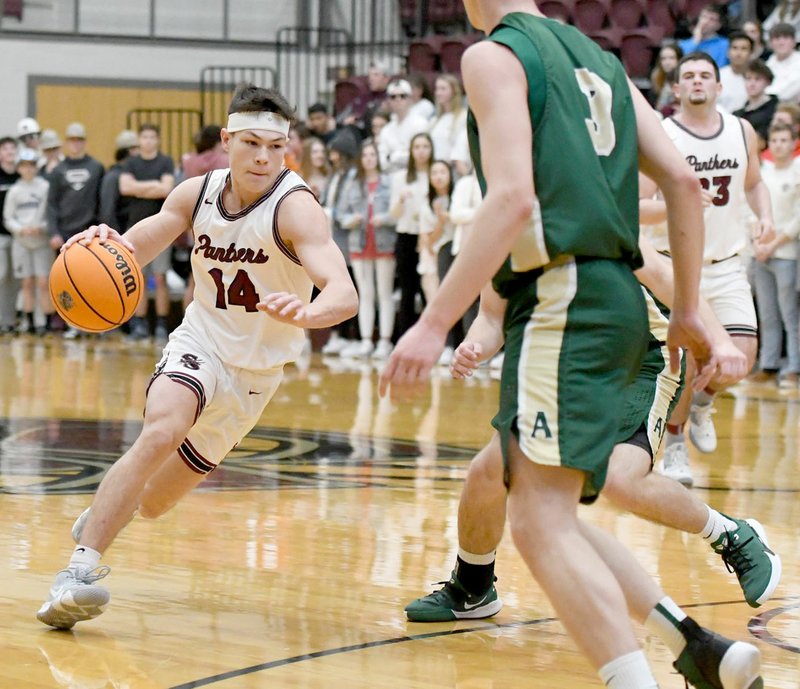 Bud Sullins/Special to Siloam Sunday Siloam Springs junior Landon Ward drives to the basket against Alma on Tuesday at Panther Activity Center.