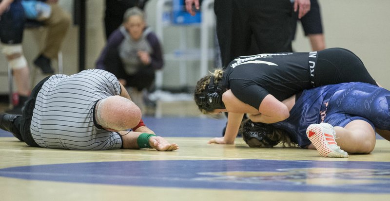 Brooklyn Scott of Bentonville pins Linlee Asbill of Rogers Heritage to win the 150 pound final Saturday, Feb. 15, 2020, during the Big West Conference wrestling tournament at Bentonville West's Wolverine Arena in Centerton. Go to nwaonline.com/photos to see more photos. (NWA Democrat-Gazette/Ben Goff)