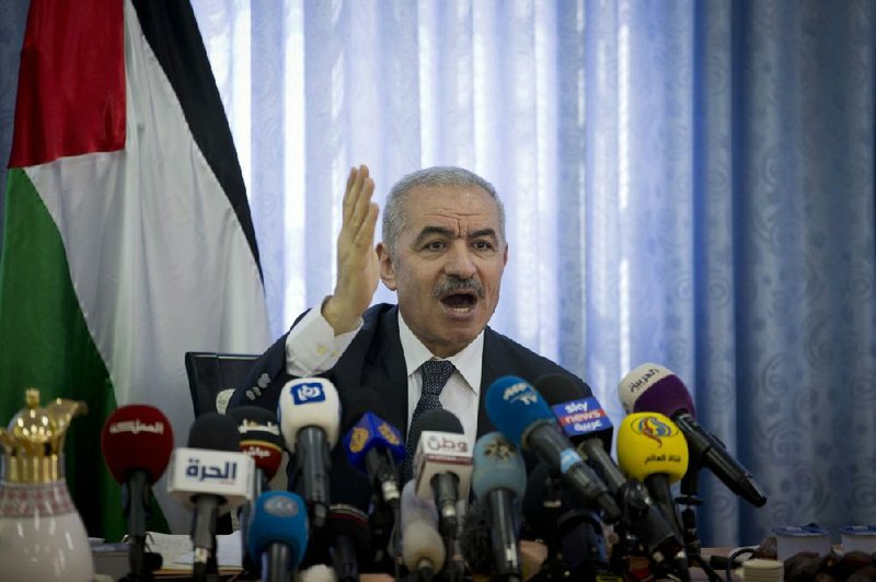 Palestinian Prime Minister Mohammed Shtayyeh leads a cabinet meeting today in the Jordan Valley village of Fasayil.
(AP/Majdi Mohammed)