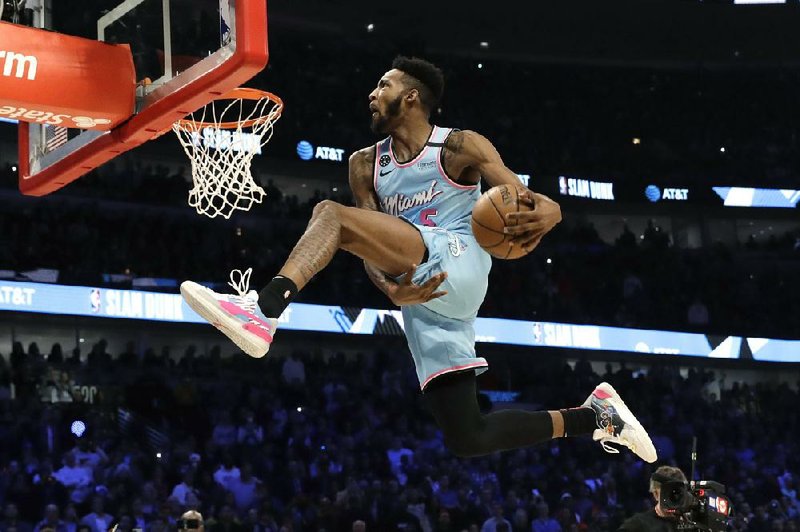 Miami’s Derrick Jones Jr. won the NBA Slam Dunk contest Saturday at the United Center in Chicago, defeating Orlando’s Aaron Gordon in the final round.
(AP/Nam Y. Huh)