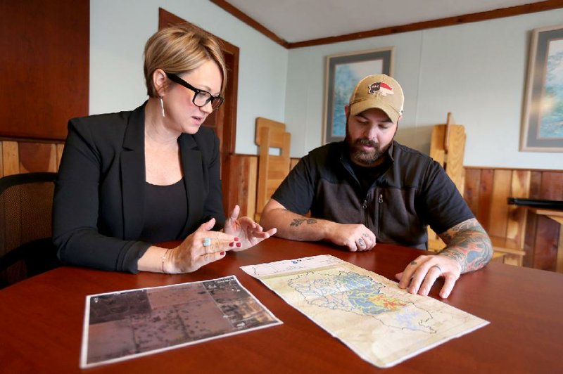 “During the first boom of population growth and development in Northwest Arkansas, our founders started looking around and said, ‘We need some sort of mechanism to permanently protect our sense of place, our clean water, our wildlife, our scenic values.’” (She is shown with Marson Nance, director of land protection and stewardship at the Northwest Arkansas Land Trust.)
(NWA Democrat-Gazette/David Gottschalk)