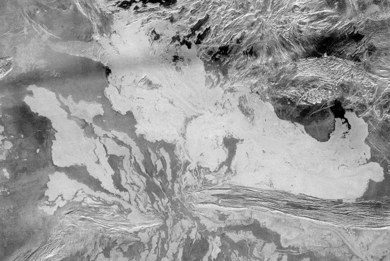 A radar image taken by the Magellan spacecraft in 1996, shows lava flows and pools on the surface of Venus. (The New York Times/NASA/JPL)
