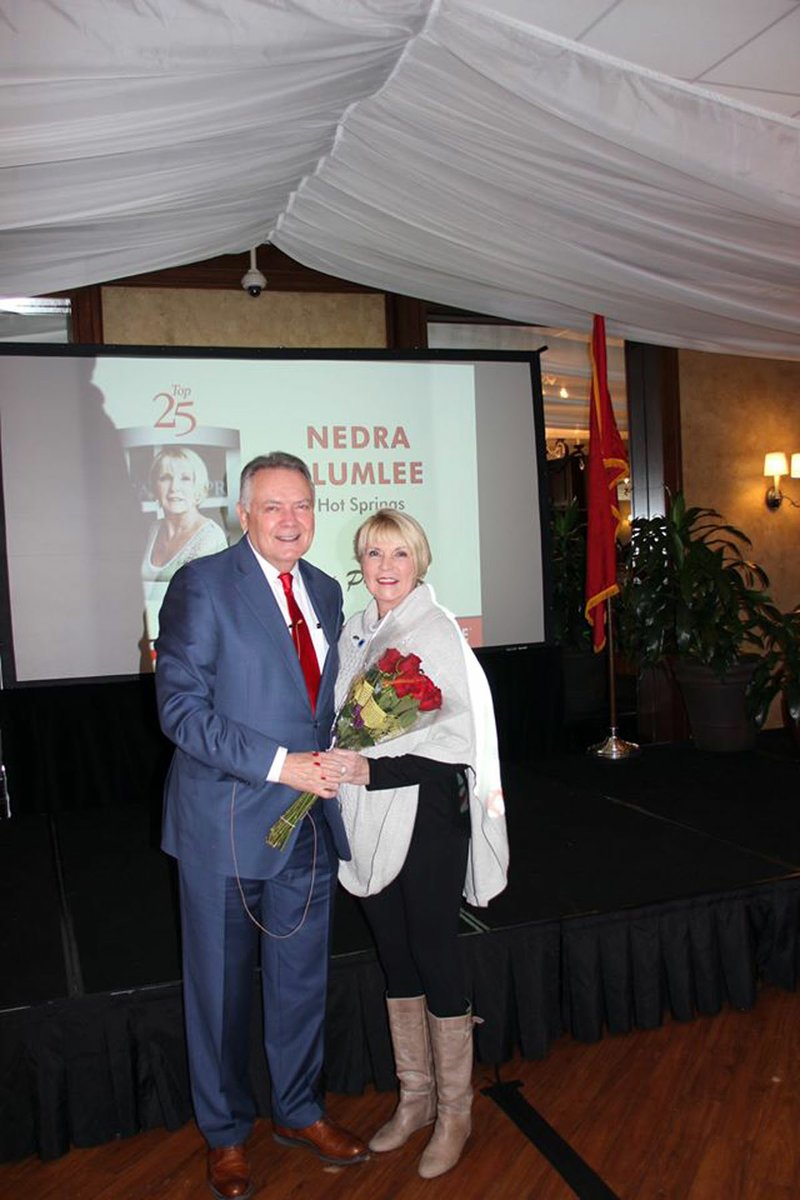 Executive Broker Nedra Plumlee, right, was honored by CEO and co-founder Harold Crye at Crye-Leike's Central Arkansas Kick-Off meeting in January. - Submitted photo