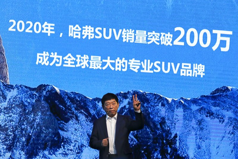 FILE - In this Feb. 19, 2017, file photo, Wei Jianjun, chairman of Great Wall Motors Ltd., gestures as he speaks during an event celebrating it sales passing the one million mark, at the Great Wall headquarters in Baoding in north China's Hebei province. General Motors decision to pull out of Australia, New Zealand and Thailand as part of a strategy to exit markets that don't produce adequate returns on investments raised dismay Monday, Feb. 17, 2020 from officials concerned over job losses. The words behind reads "By 2020, Haval SUV sales will pass 2 million, become the world's biggest specialty SUV brand." (AP Photo/Andy Wong)