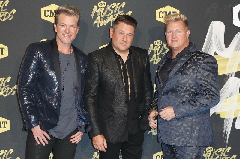 Rascal Flatts — (from left) Joe Don Rooney, Jay DeMarcus and Gary LeVox — perform July 17 at the Walmart AMP in Rogers. The country group announced Jan. 7 that they have no future plans for the band after their current tour, which begins in June and runs through October. (AP Photo/Al Wagner, File)