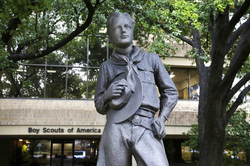 A statue stands outside the Boy Scouts of America headquarters in Irving, Texas, in this Wednesday, Feb. 12, 2020 photo. The Boy Scouts of America has filed for bankruptcy protection.

