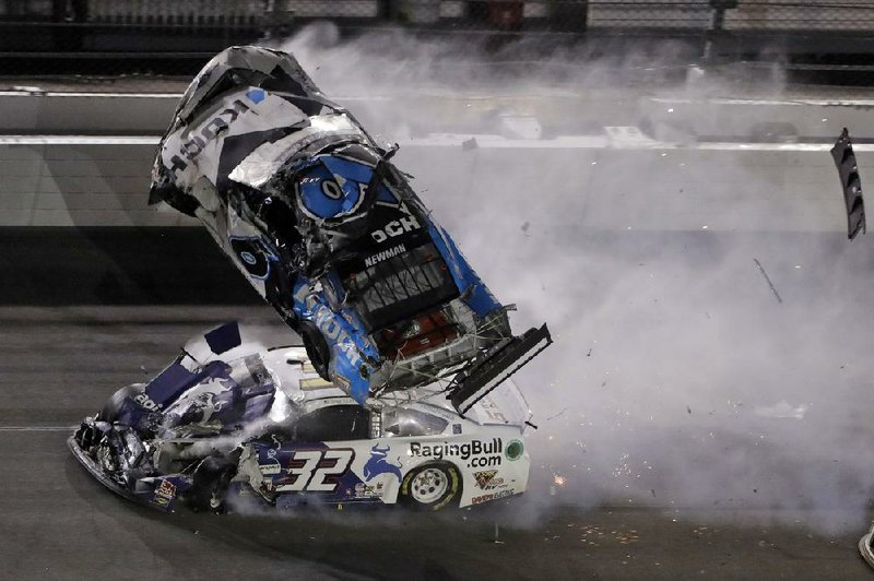 Ryan Newman crashes into Corey LaJoie (32) during the final lap of Monday’s NASCAR Daytona 500 at Daytona International Speedway in Daytona Beach, Fla. NASCAR said Monday that Newman was in serious condition, but doctors indicated his injuries are not life-threatening.
(AP/Chris O’Meara)
