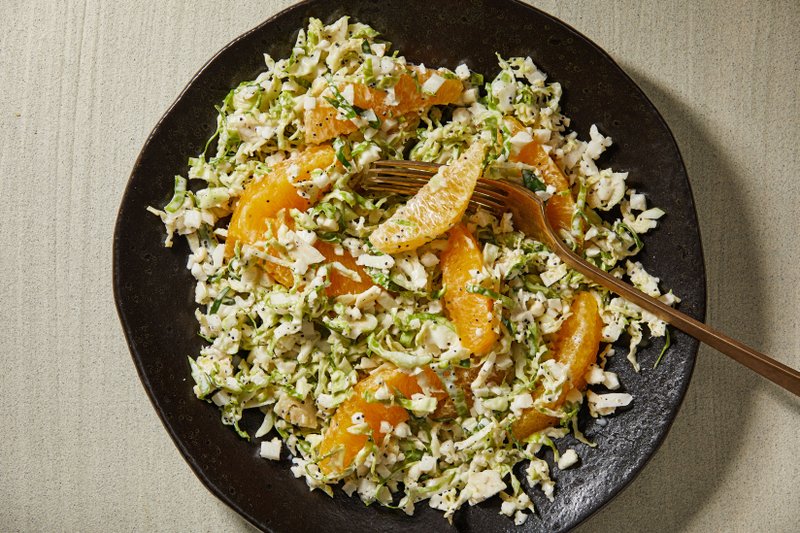 Brussels Sprouts and Cauliflower Slaw With Oranges. MUST CREDIT: Photo by Tom McCorkle for The Washington Post.