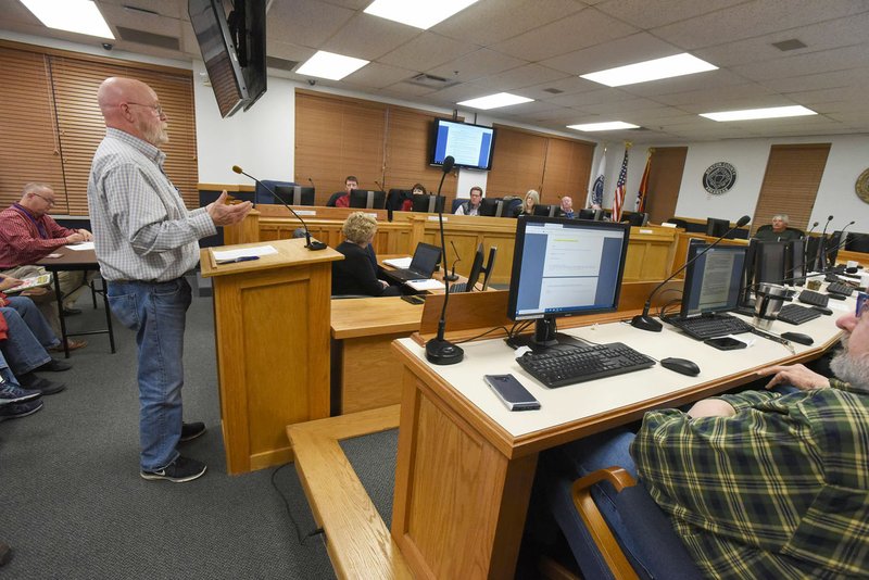 Larry Concannon of Bella Vista speaks Tuesday at the Benton County Quorum Court's Committee of the Whole meeting in Bentonville. Go to nwaonline.com/200219Daily/ to see more photos. (NWA Democrat-Gazette/Flip Putthoff)