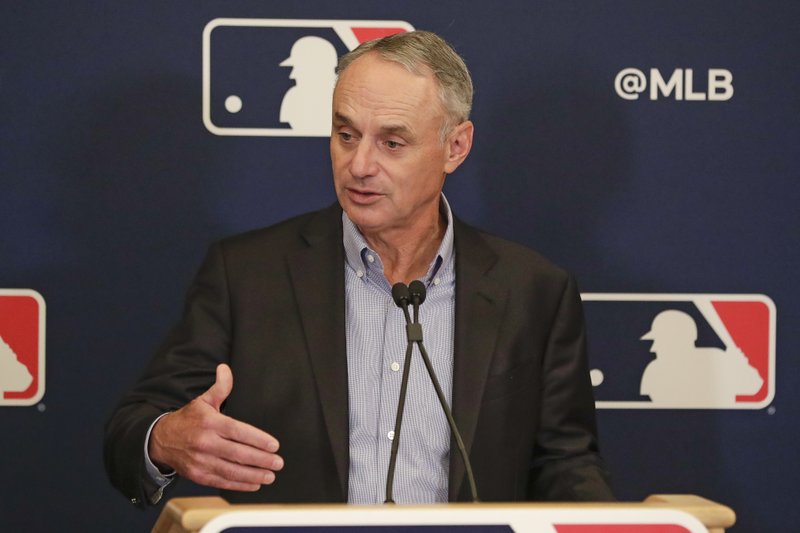 MLB Commissioner Rob Manfred answers questions at a press conference during MLB baseball owners meetings, Thursday, Feb. 6, 2020, in Orlando, Fla. 
(AP Photo/John Raoux)