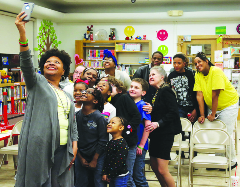 Ussie: Mayor Veronica Smith-Creer takes an "ussie" with those attending the program Feb. 18 at the Barton Public Library. Smith-Creer said she takes "ussies," or group pictures, in memory of her younger sister who died in 2017. 