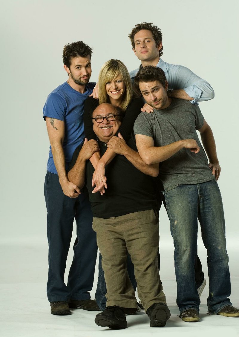 Glenn Howerton (clockwise from top right), Charlie Day, Danny DeVito, Kaitlin Olson and Rob McElhenney star in It’s Always Sunny in Philadelphia. Day and McElhenney, who helped create Sunny, are also among the creators of the AppleTV+ sitcom Mythic Quest: Raven’s Banquet.