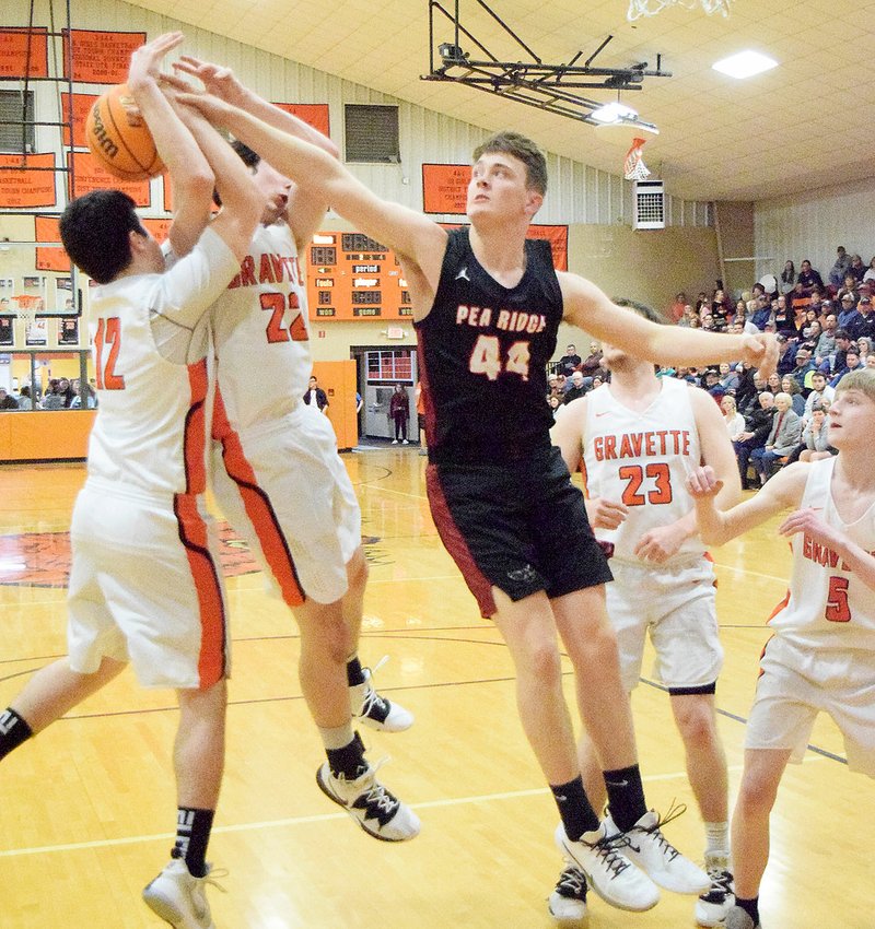 Staff photograph by Mike Eckels Senior Blackhawk Mazon Harris (No. 44) Mazon Harris slides over to contest a shot Friday night during Gravette's senior night games Friday, Feb. 14.