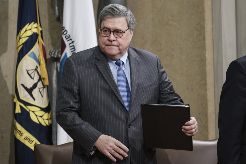 In this Jan. 22 file photo, Attorney General William Barr arrives for an ceremony at the Department of Justice in Washington to announce the establishment of the Presidential Commission on Law Enforcement and the Administration of Justice, and its commissioners.  (AP Photo/Michael A. McCoy)