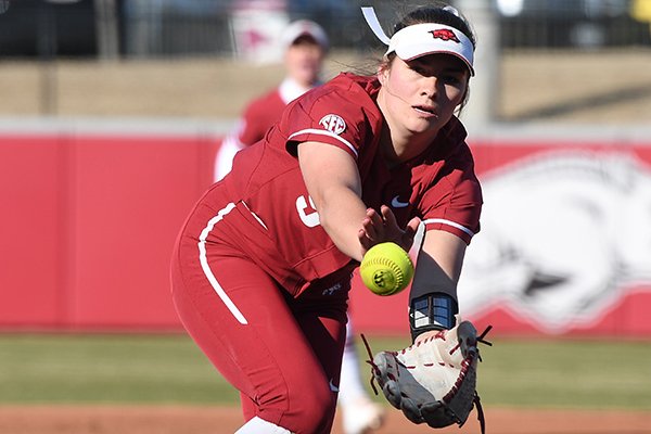 Arkansas pitcher Autumn Storms fields during a game against Boston on Thursday, Feb. 20, 2020, in Fayetteville. 