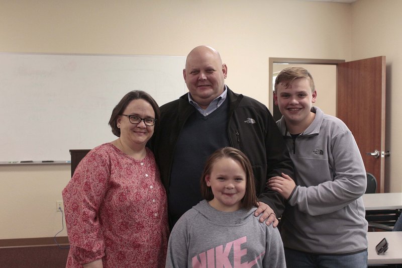 Capt. Scott Harwell, center, of El Dorado Police Department’s Criminal Investigation Divsion, with his wife Katie, left, son Gray, right, and daughter Mille, front/center.