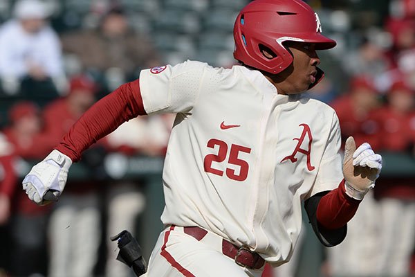 Arkansas center fielder Christian Franklin heads to first Thursday, Feb. 20, 2020, during the second inning against Gonzaga at Baum-Walker Stadium.