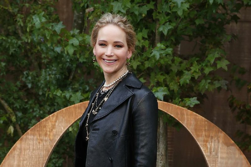 In this Sept. 24, 2019 file photo, actress Jennifer Lawrence smiles during a photocall before Dior's Ready To Wear Spring-Summer 2020 collection, unveiled during the fashion week, in Paris. 
(AP Photo/Francois Mori, File)