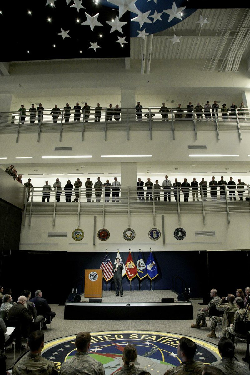 U.S. Secretary of Defense Mark Esper fields questions Thursday during a visit to the U.S. Strategic Command at Offutt Air Force Base near Omaha, Neb. More photos at arkansasonline.com/221esper/
(AP/Nati Harnik)