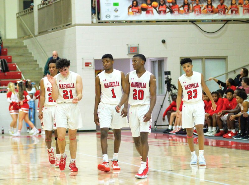 Magnolia's starting five of Braelyn Beasley (22), Kyle Carver (21), Devonte Walker (1), Derrien Ford (20), and Colby Garland (23) take the floor against Hamburg in the Panthers' home finale on Feb. 18, 2020. The undefeated team faces Warren on the road Friday to close out the regular season.  