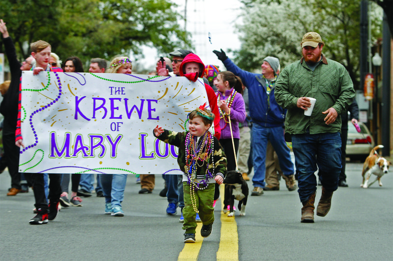Mardi Gras Parade: Grand Marshal 3-year-old Jack Price leads the third annual Krewe of Mary Lou Mardi Gras Parade through the streets of downtown El Dorado in 2019. This year's parade is scheduled for Sunday, Feb. 23 at 2:23 p.m. 
