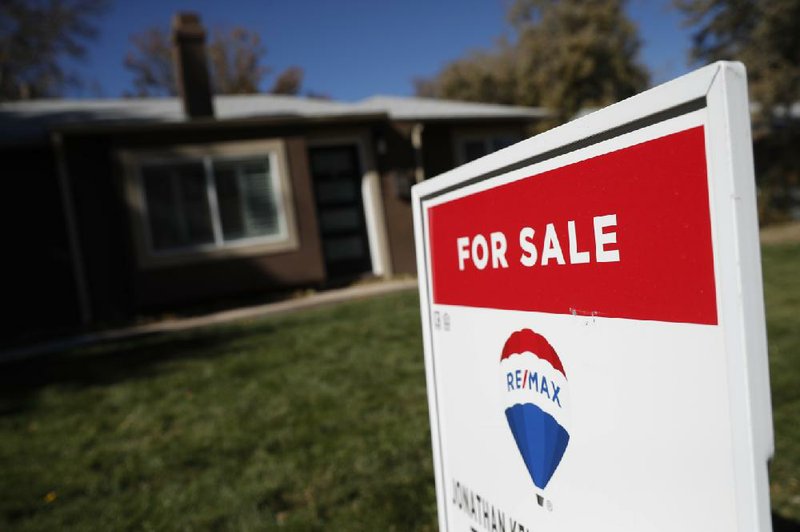 Sales of existing U.S. homes slipped 1.3% in January, but were 9.6% higher than last January because of falling mortgage rates.
(AP/David Zalubowski)