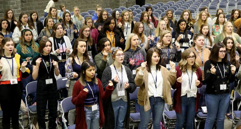 Singers in the Soprano Alto Tenor Bass Choir rehearse during the Arkansas All-State Music Conference at the Hot Springs Convention Center on Friday. The conference has around 900 student musicians and singers in attendance. - Photo by Richard Rasmussen of The Sentinel-Record