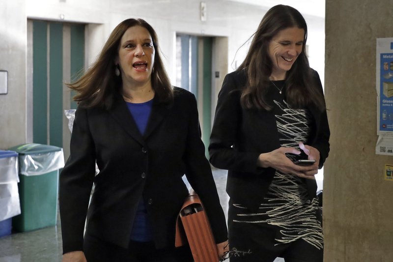 Assistant District Attorneys and Joan Illuzzi, left, and Meghan Hast arrive at court for the Harvey Weinstein rape trial Friday in New York. - AP Photo/Richard Drew