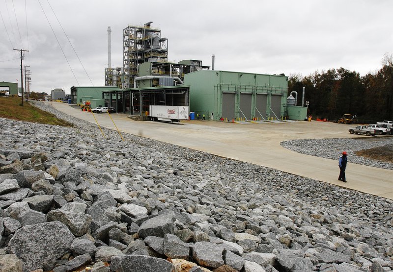 Incinerator: In this December 2016 file photo, an employee walks across the Clean Harbors’ complex in El Dorado with the new technologically advanced incinerator shown in the background. The company unveiled the new incinerator four years ago. Clean Harbors was recently named in a lawsuit against the U.S. Department of Defense.