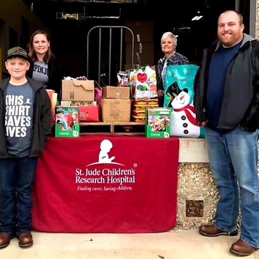 Fifth-grader Jackson Bradford organized a drive to benefit children at St. Jude Children's Research Hospital by collecting and personally delivering nearly 2,500 pieces of arts and crafts materials to Memphis. Jackson was able to gather crayons, coloring books and other art supplies for St. Jude, then, along with parents Katelyn and Kyle Watkins and grandmother Bonnie Glover, delivered the materials on Jan. 17. - Submitted photo story.lead_photo.caption