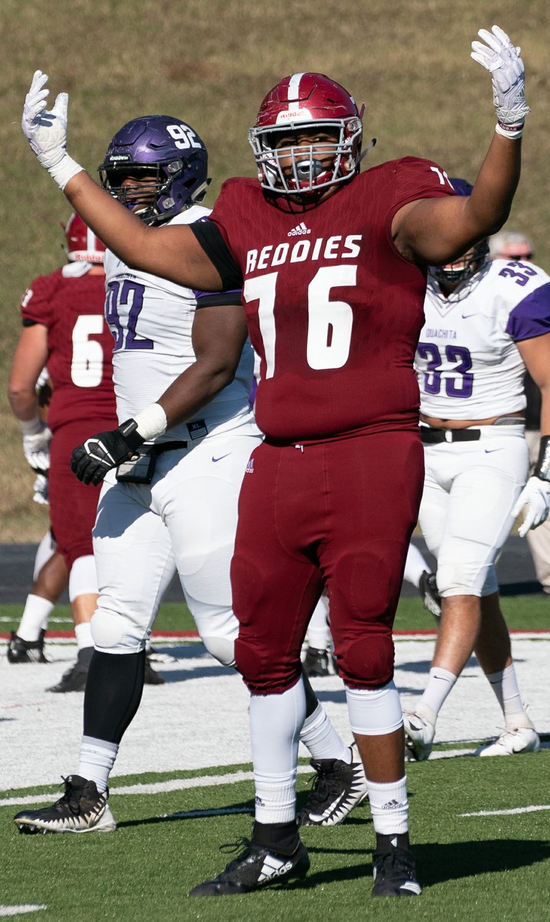 Henderson State offensive lineman Clifford Jackson III works to pump up the crowd during The Battle of the Ravine against Ouachita Baptist on Nov. 14, 2019. Jackson signed to play football with the Tampa Bay Tornadoes. - Photo courtesy of HSU Sports Information