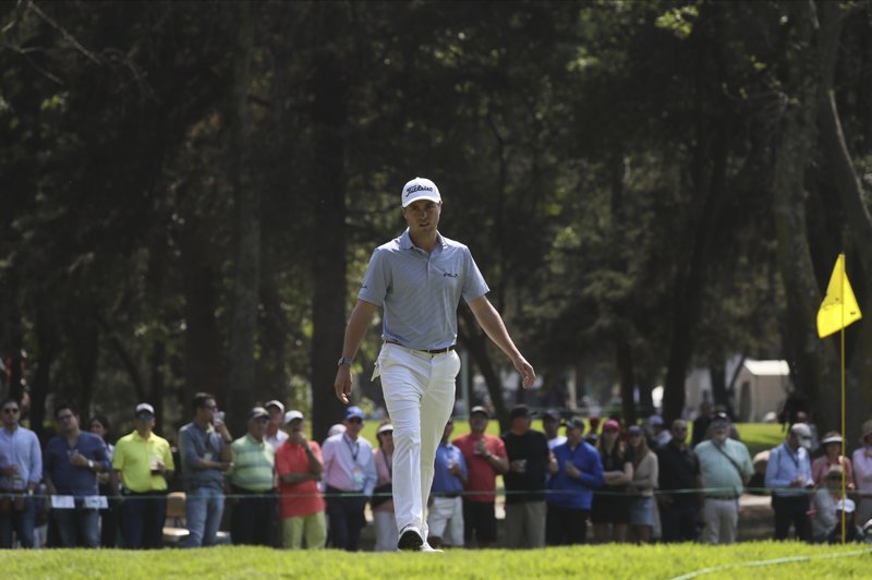Justin Thomas of the United States walks towards the third green during the second round of the WGC-Mexico Championship golf tournament, at the Chapultepec Golf Club in Mexico City, Friday, Feb. 21, 2020. (AP Photo/Fernando Llano)