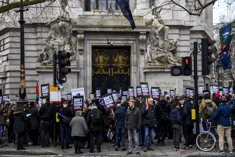 Demonstrators gather outside Australia House to protest against the extradition of Wikileaks founder Julian Assange, in London, Saturday, Feb. 22, 2020. Assange is fighting extradition to the United States on spying charges.(AP Photo/Alberto Pezzali) story.lead_photo.caption