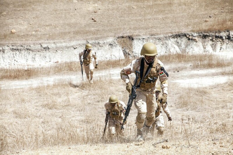 Burkina Faso paratroopers run a commando exercise under the supervision of Dutch special forces during a U.S. military-led annual counterterrorism exercise in Thies, Senegal, in this Tuesday Feb. 18, 2020, photo. More than 1,500 service members from the armies of 34 African and partner training nations assembled for the Flintlock exercises in Senegal and Mauritania, the two countries in West Africa's sprawling Sahel region that so far have not been hit by violence from extremists linked to al-Qaida or the Islamic State extremist group.