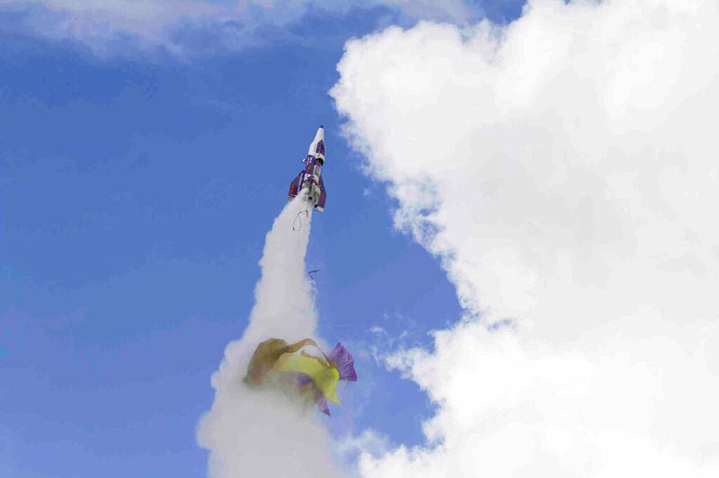 A parachute appears to tear off a rocket owned by "Mad" Mike Hughes on Saturday afternoon, Feb. 22, 2020, as the rocket launches near Barstow, Calif.
