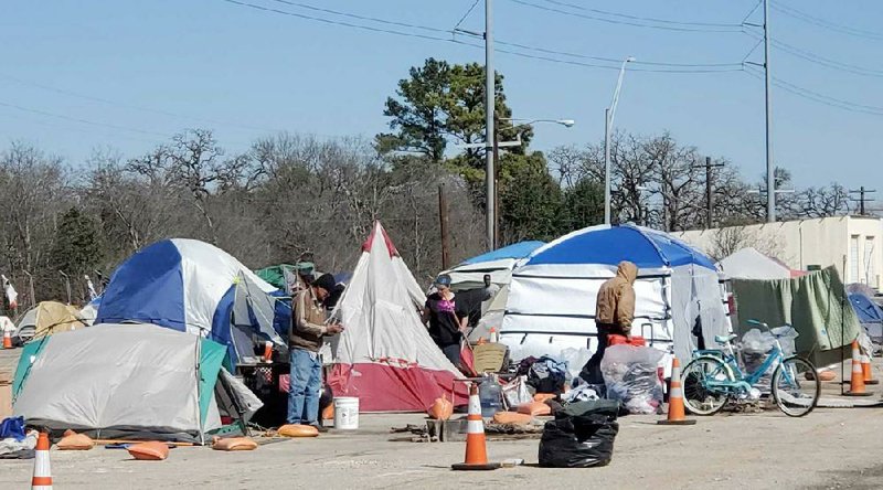 About 100 people are housed at Austin’s state-run camp for the homeless. A self-appointed seven-member committee of residents has dubbed it Camp Responsible Adult Transition Town, or Camp RATT.
(Los Angeles Times/Molly Hennessy-Fiske)