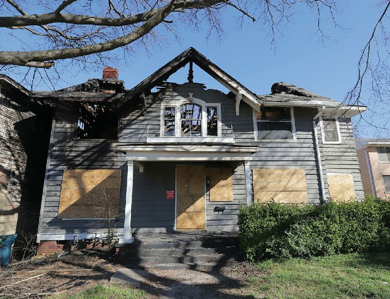 Several downtown Little Rock historic houses like this one at 1415 Spring St. have caught fire or burned down in recent weeks, and city officials are concerned.
(Arkansas Democrat-Gazette/John Sykes Jr.)